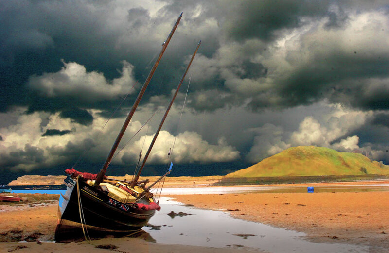 Boat on a stormy beach