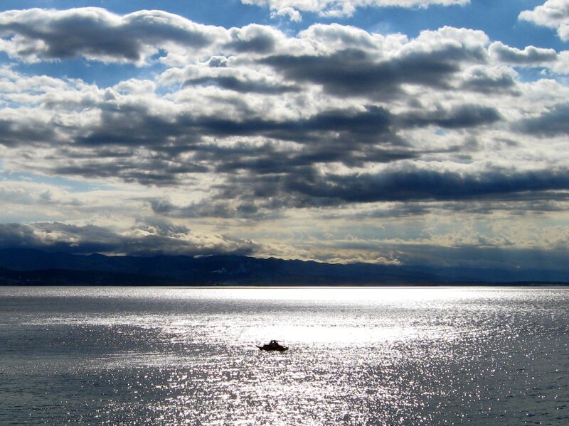 Boat on a sunlit sea