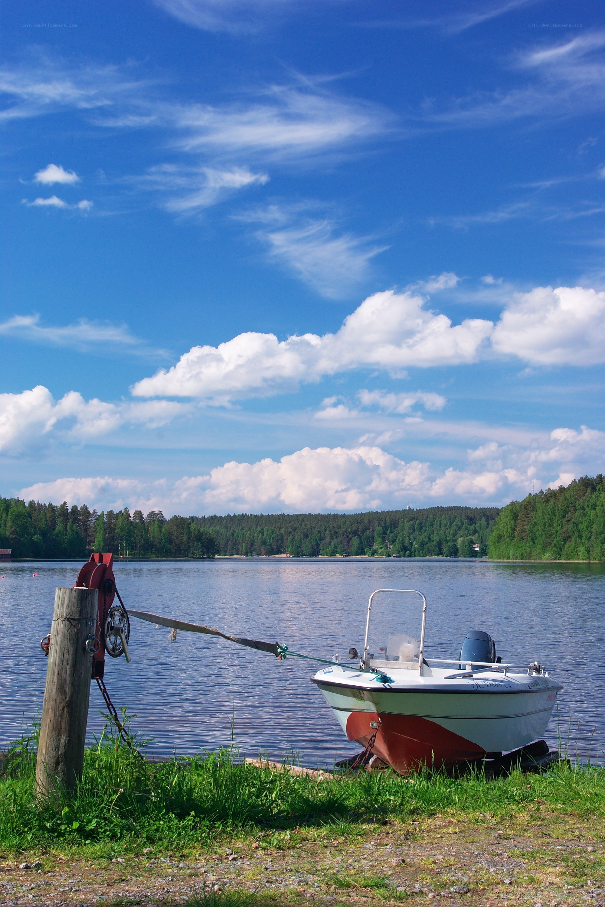 Boat on a sunny lakeside