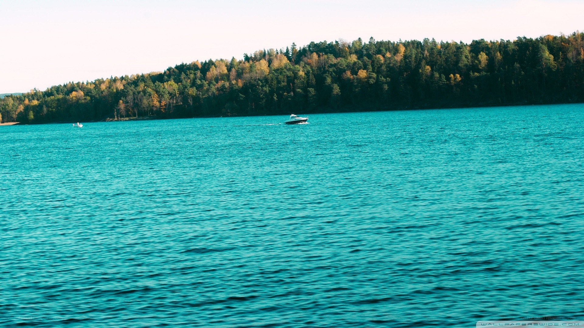 Boat on a turquoise lake