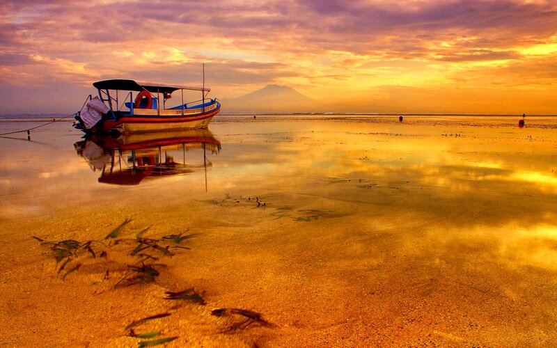 Boat on Beach at Sunrise