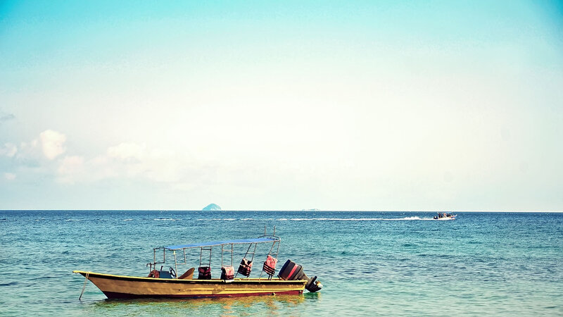 Boat on Calm Sea — Blue