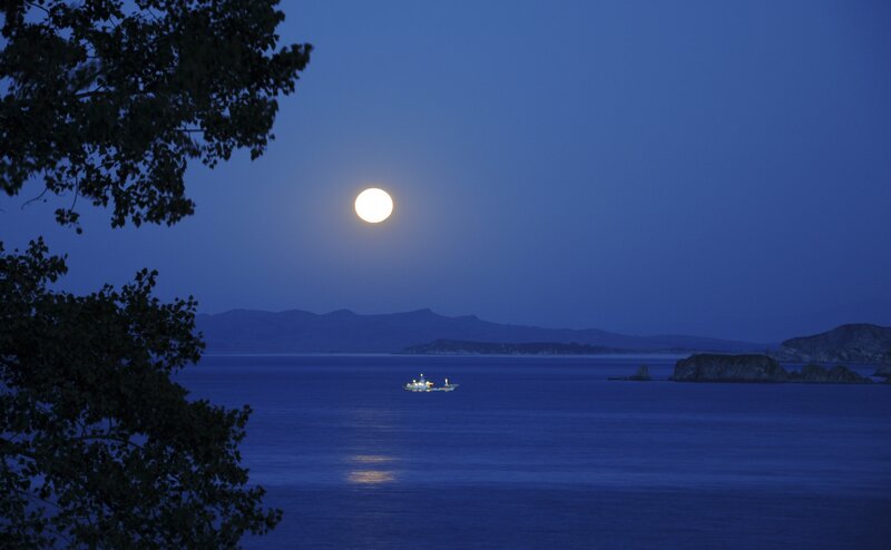 Boat on Calm Water — Blue, Serene, Night