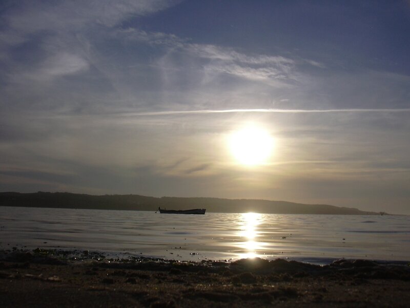 Boat on Calm Water — Blue, Serene, Sunset, Photograph, Sun, Sky