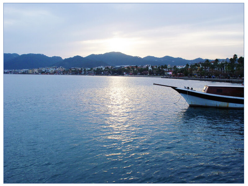 Boat on Calm Water — Blue, Serene, Sunset