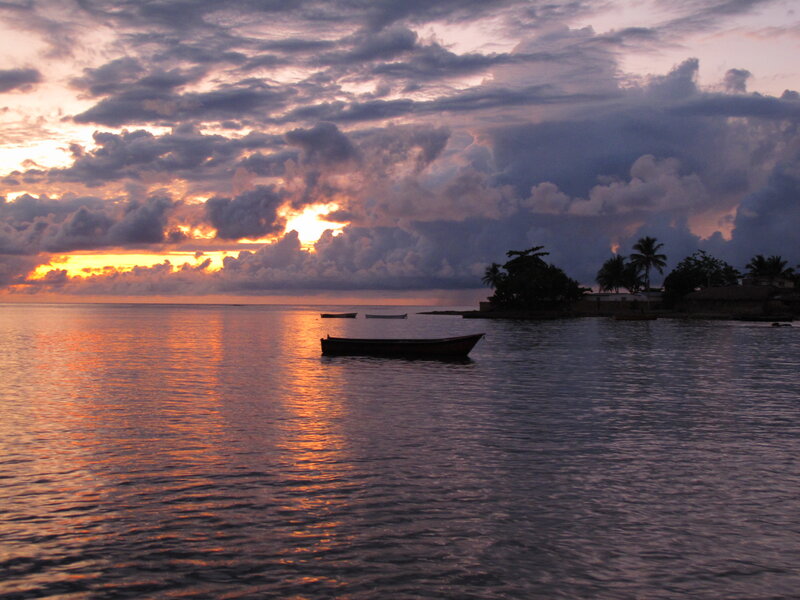 Boat on Calm Water — Orange, Serene, Sunset, Photograph, Boats