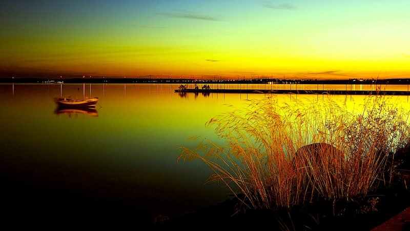 Boat on Calm Water — Yellow