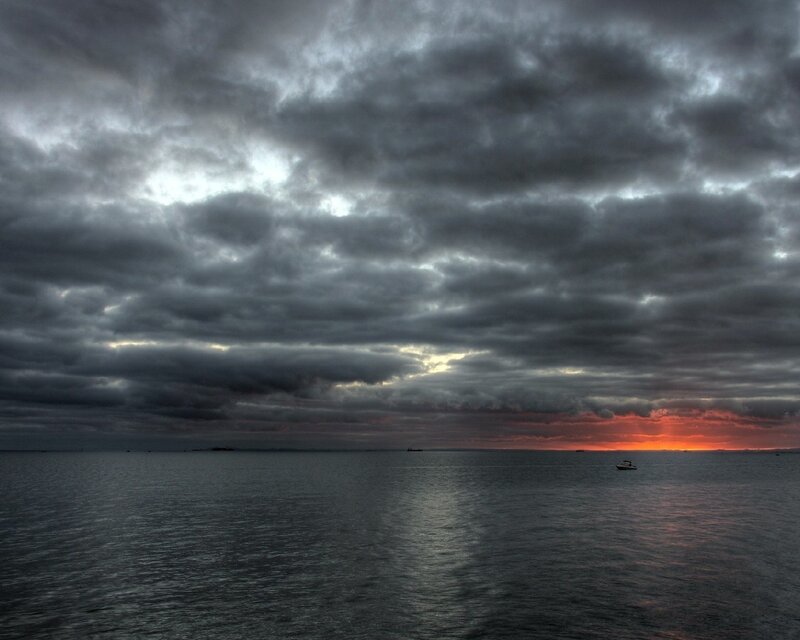 Boat on Dark Water — Photograph