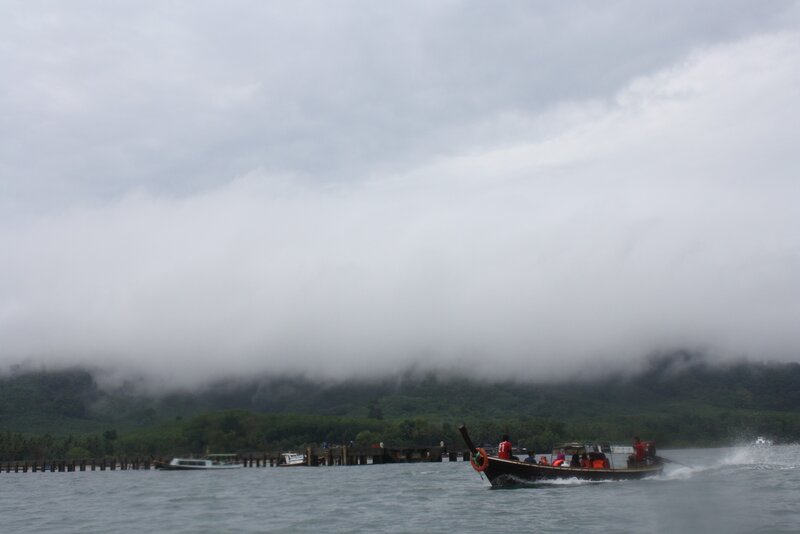 Boat on foggy water