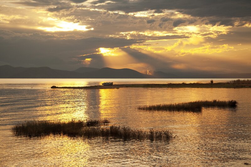 Boat on Lake at Sunset — Gold, Serene