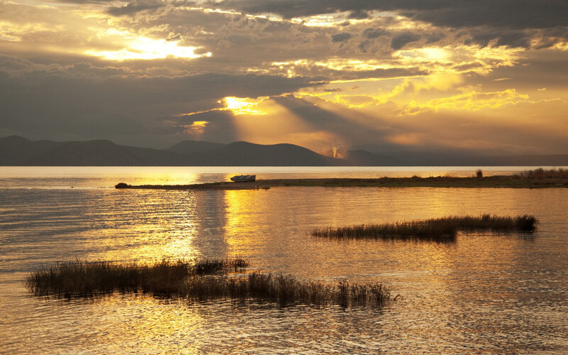 Boat on Lake at Sunset — Gold
