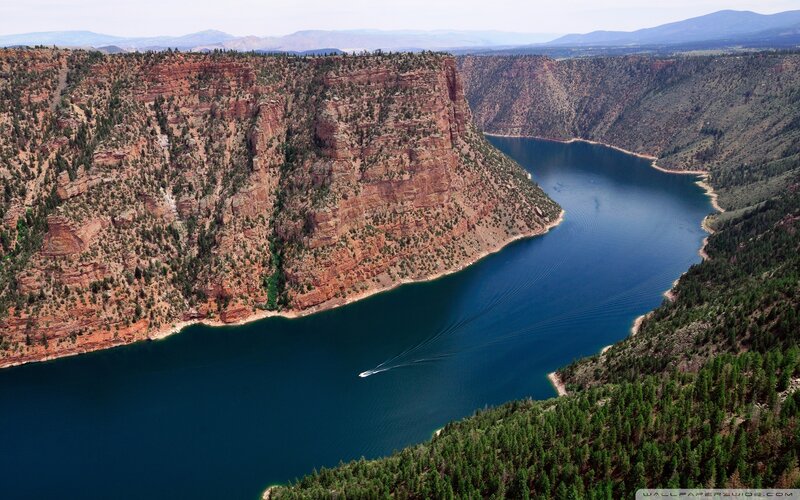 Boat on Lake in Canyon