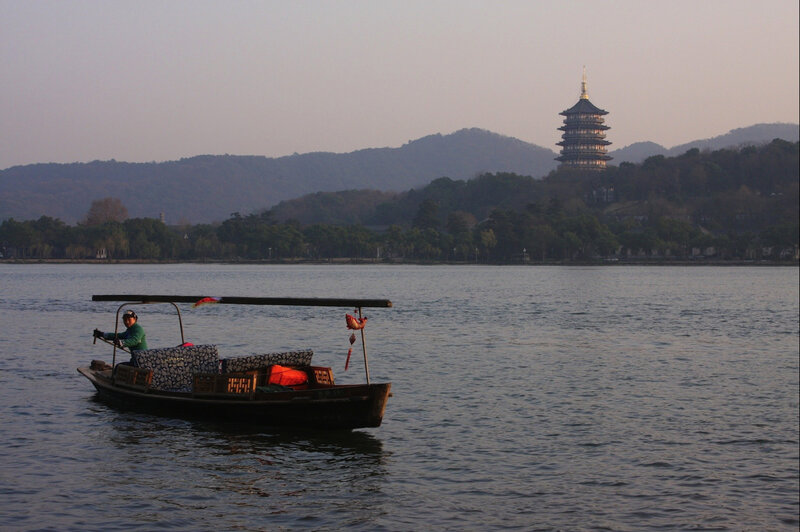 Boat on lake with pagoda