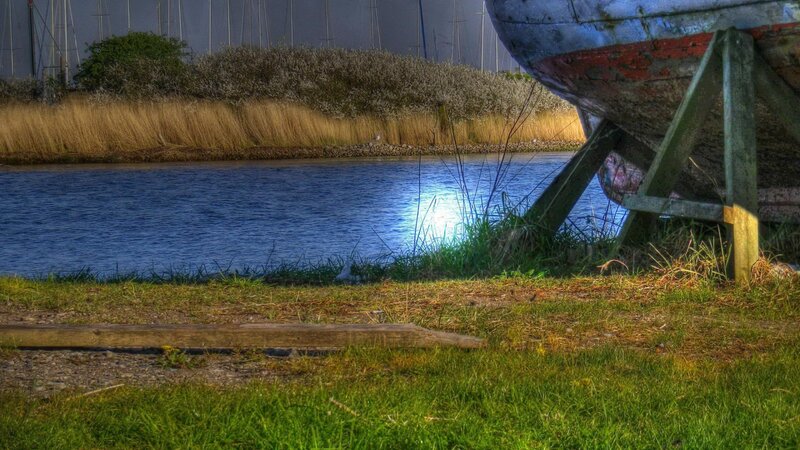 Boat on Land Near Water