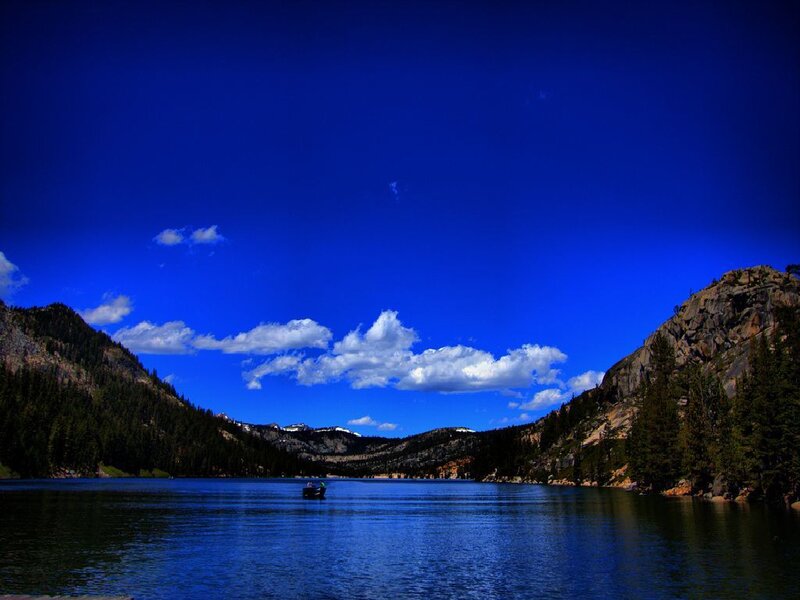 Boat on Mountain Lake — Blue, Serene, Afternoon