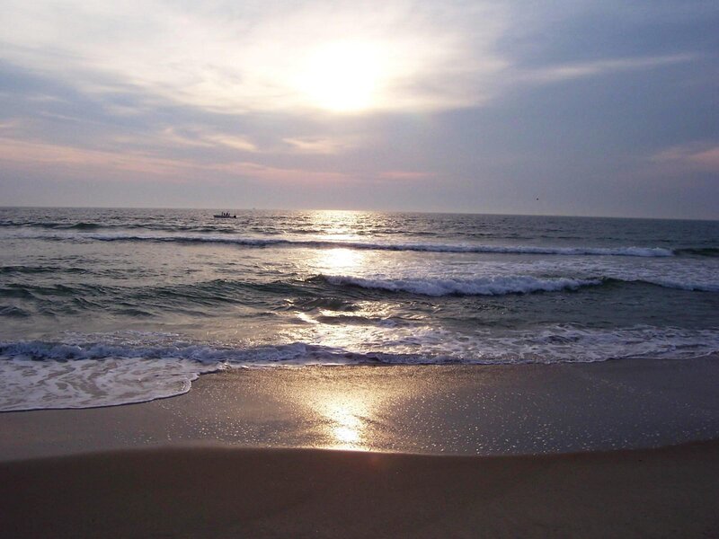 Boat on Ocean at Sunset — Blue, Serene