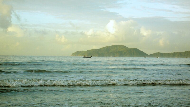 Boat on Ocean Near Island