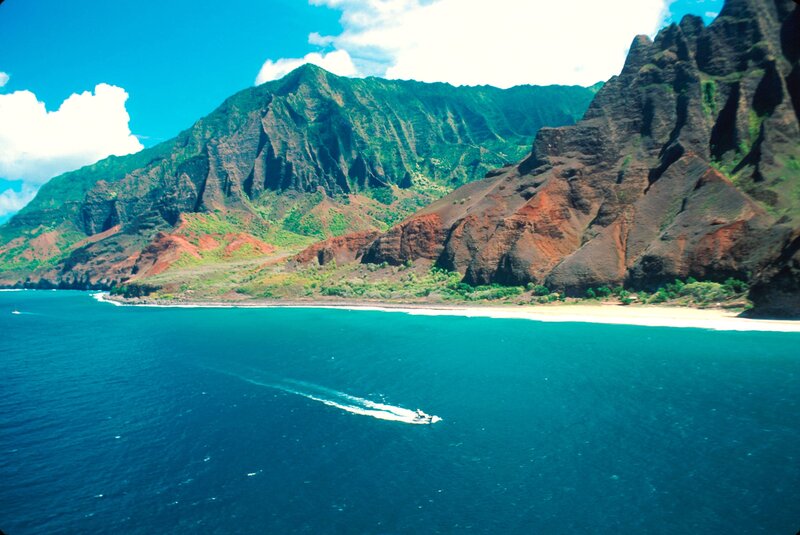 Boat on Ocean Near Mountains