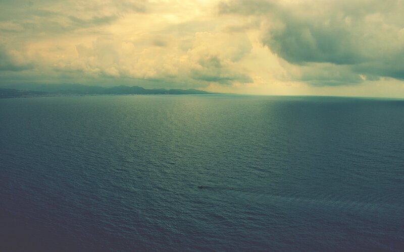 Boat on Open Sea — Blue