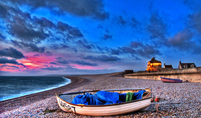 Boat on Pebble Beach — Blue, Dramatic, Sunset, Photograph