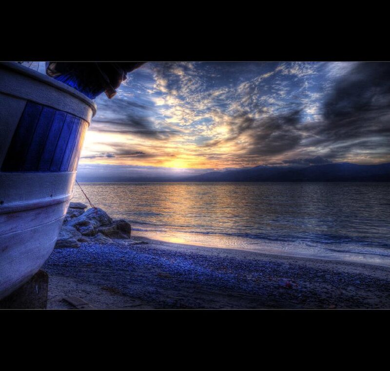Boat on Pebble Beach — Blue
