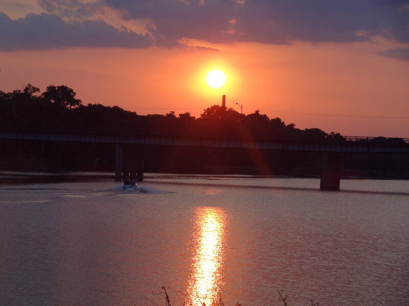 Boat on River at Sunset — Orange, Serene, Photograph