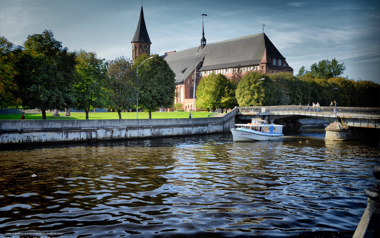 Boat on river near church