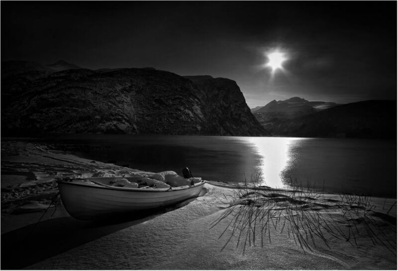Boat on Snowy Shore
