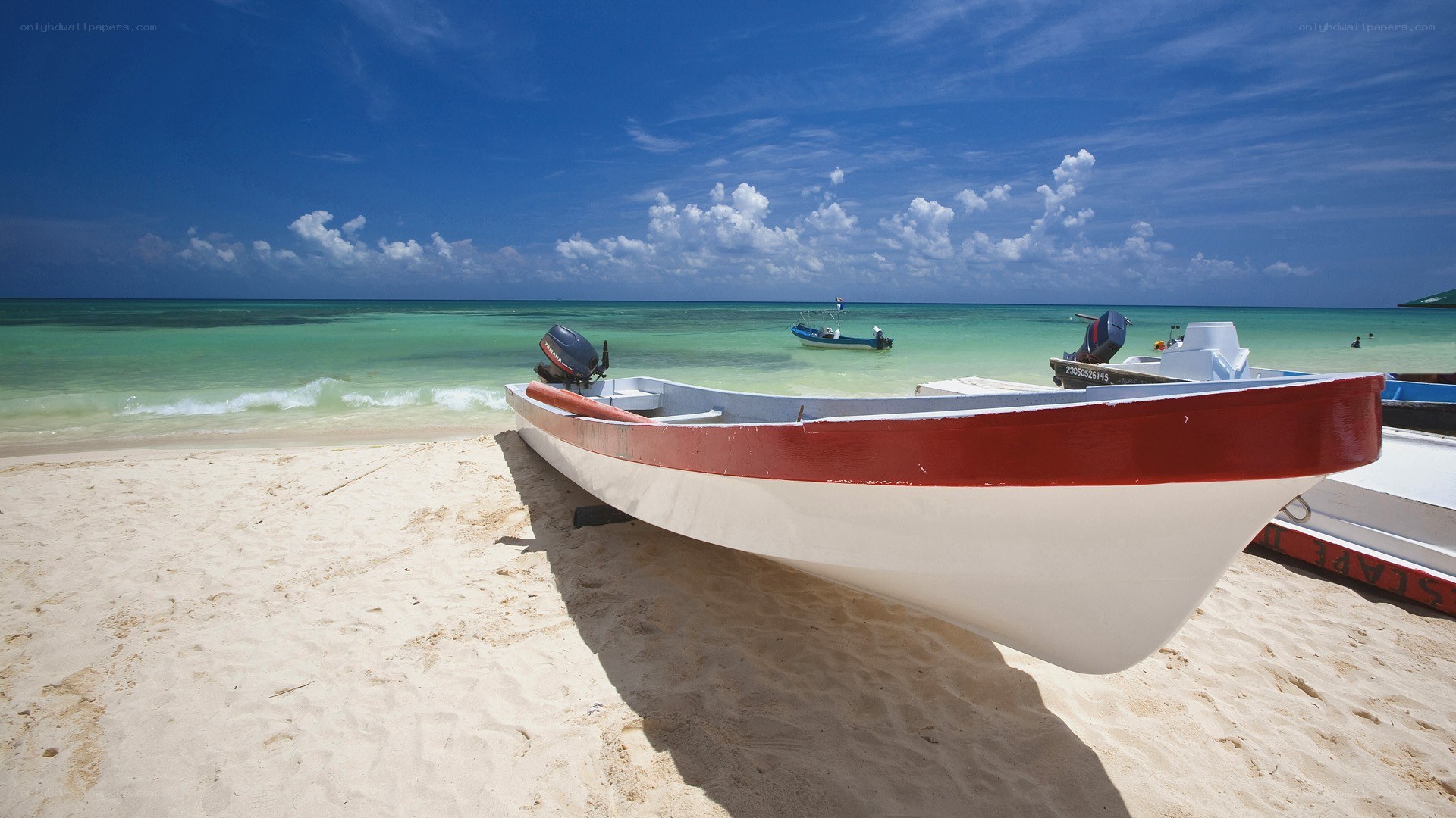 Boat on tropical beach