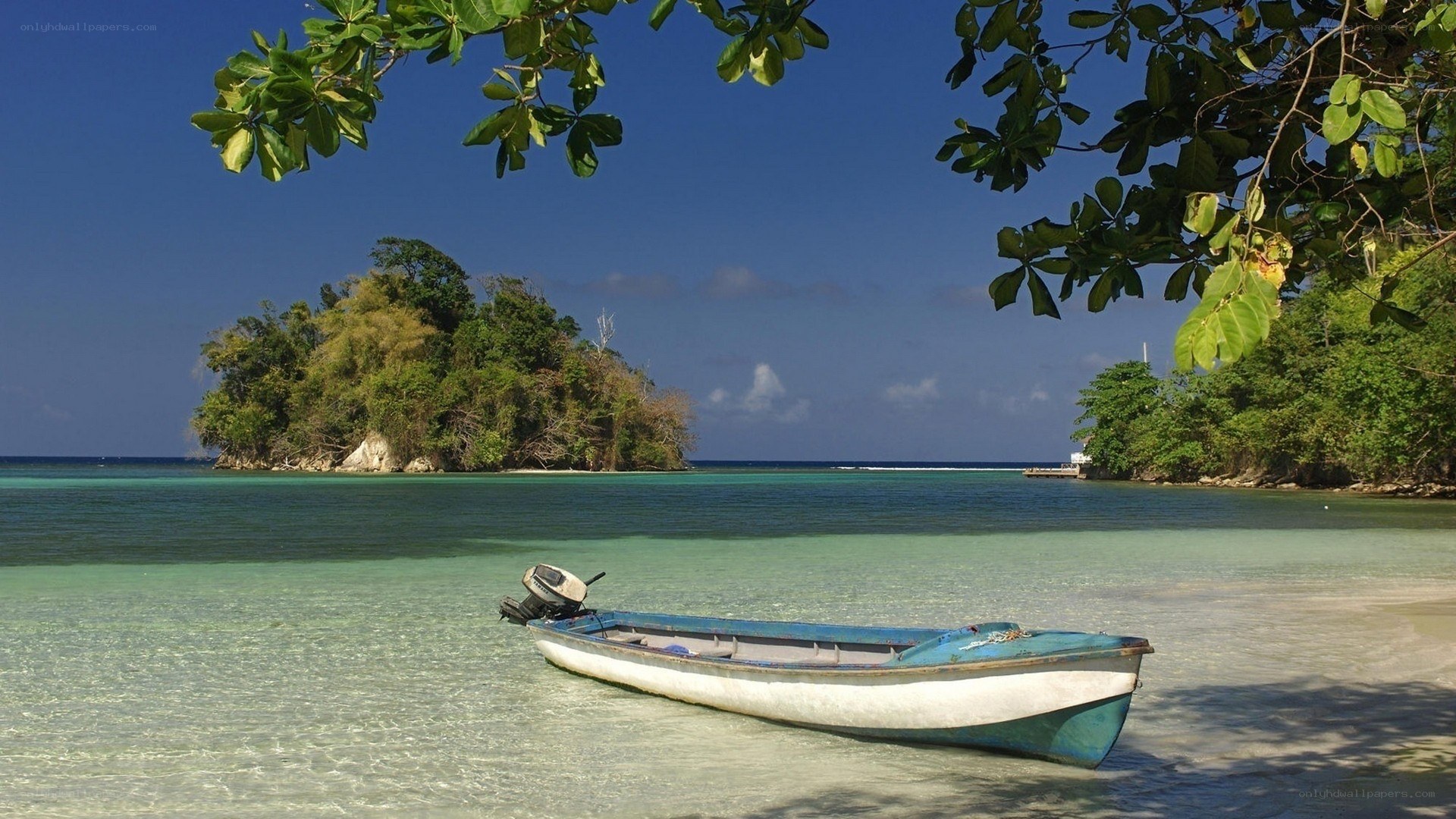 Boat on tropical beach