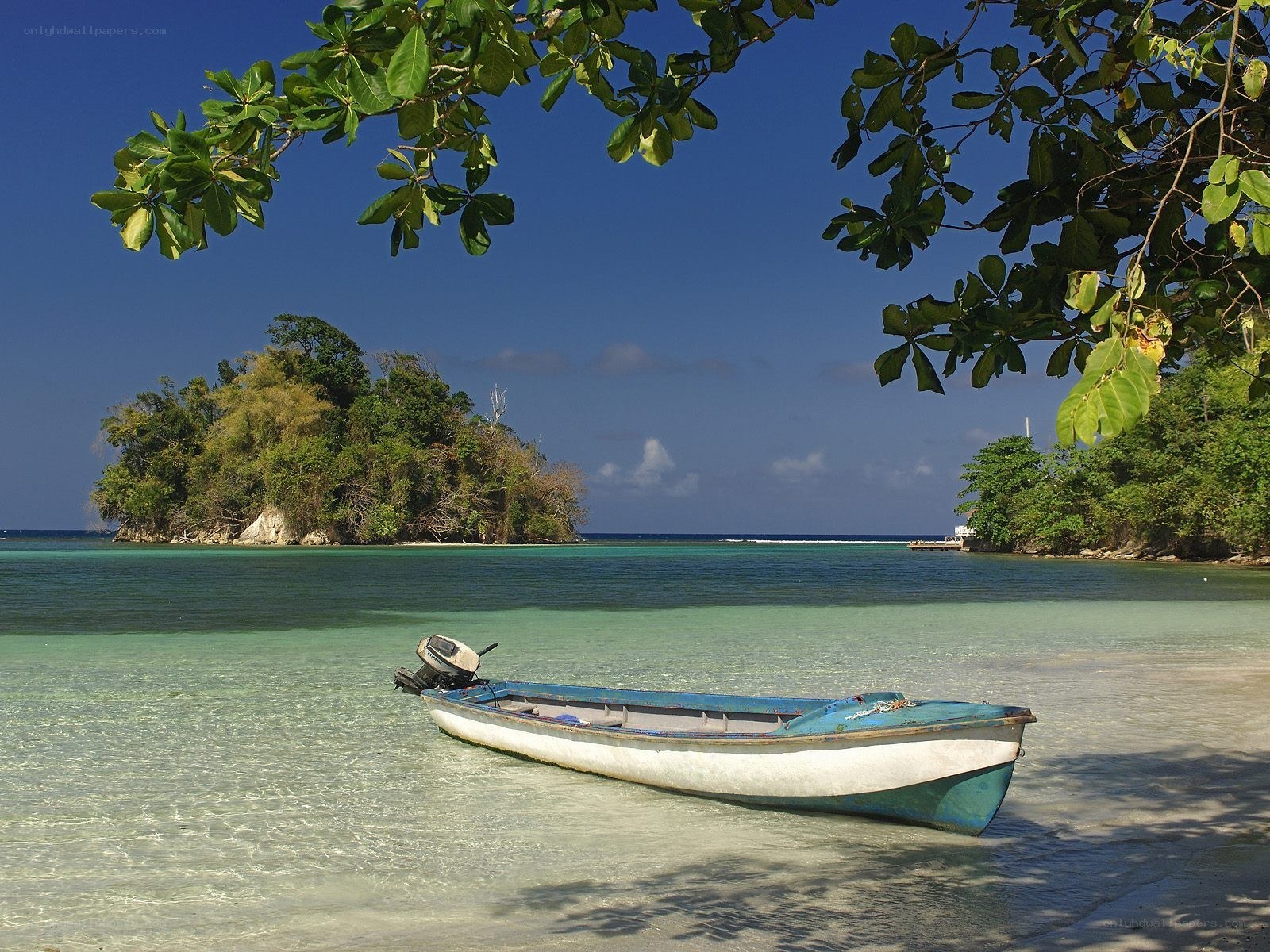 Boat on tropical beach