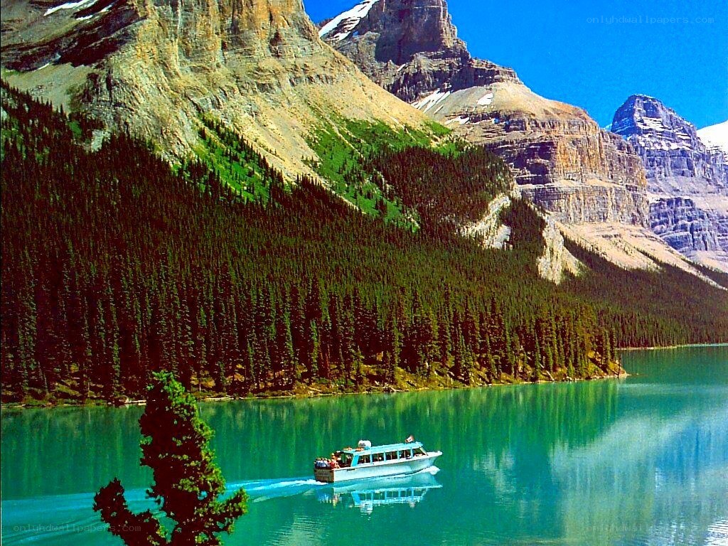 Boat on turquoise lake