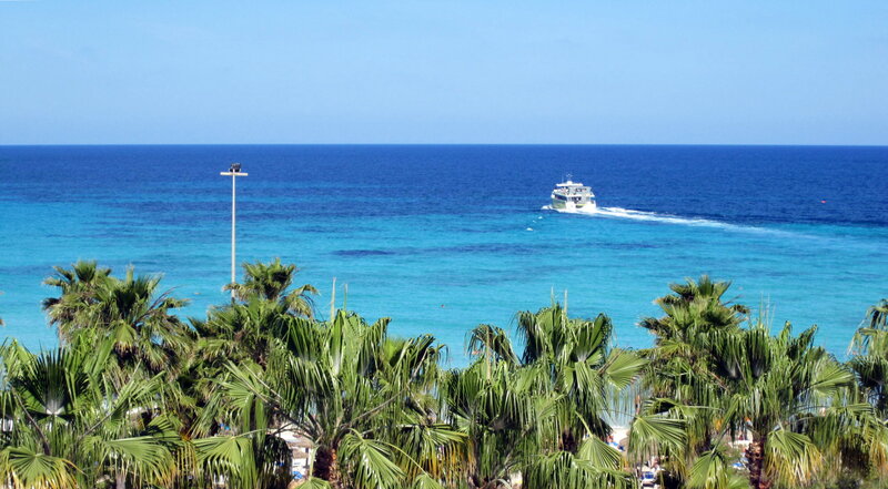 Boat on Turquoise Water — Blue, Serene, Afternoon