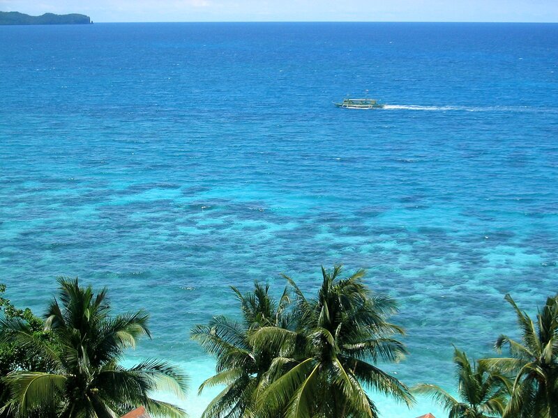 Boat on Turquoise Water — Blue, Serene