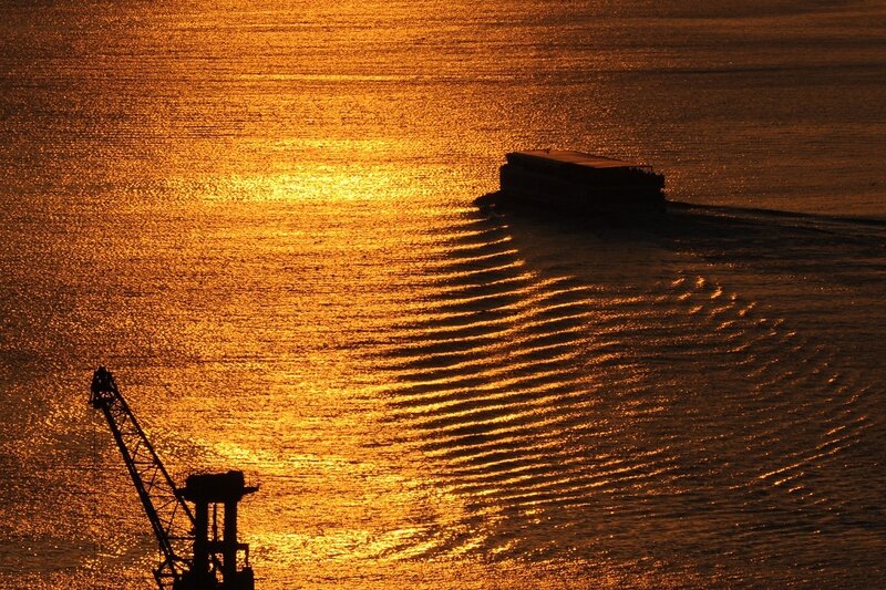 Boat on Water at Sunset — Gold
