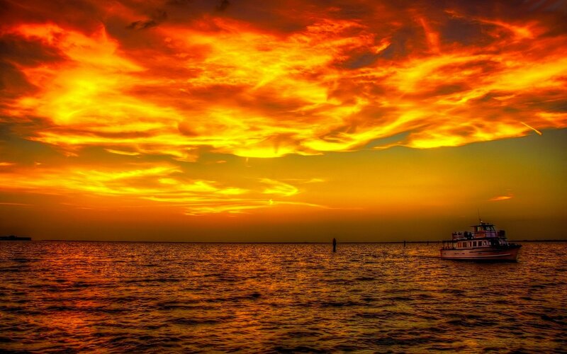 Boat on Water at Sunset — Orange, Dramatic, Photograph, Sky