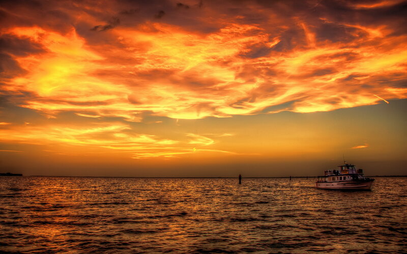 Boat on Water at Sunset — Orange, Dramatic