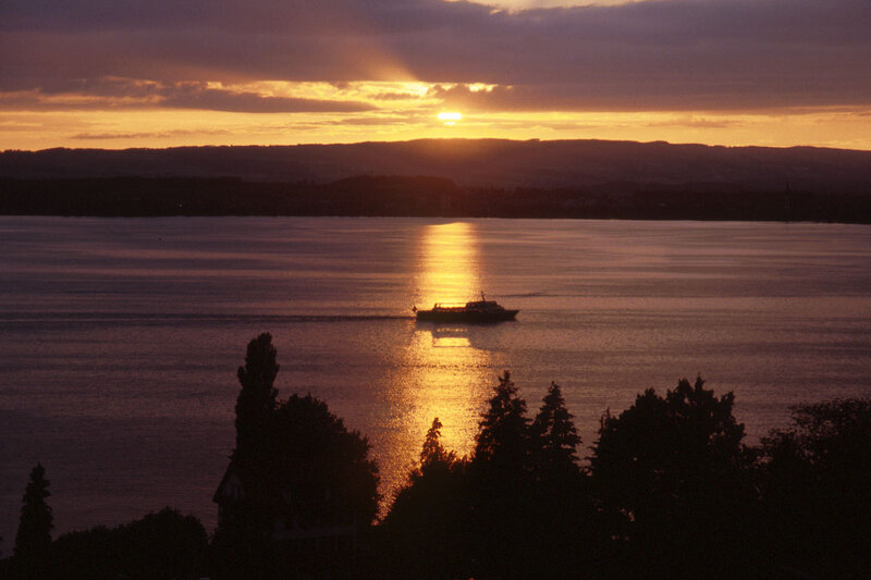 Boat on Water at Sunset — Orange
