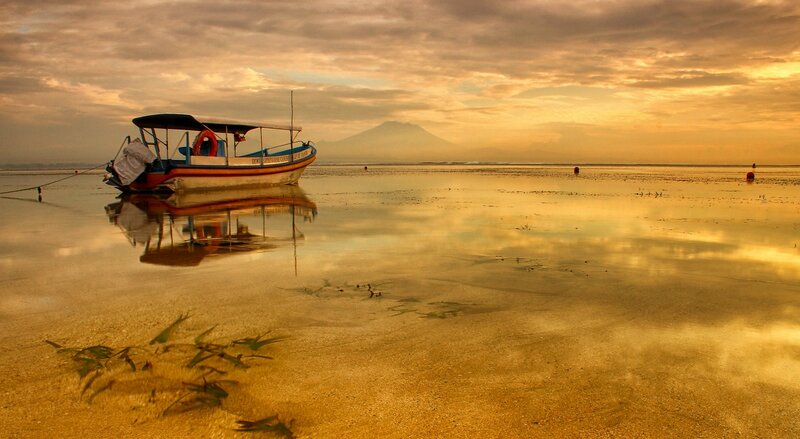Boat on Wet Sand