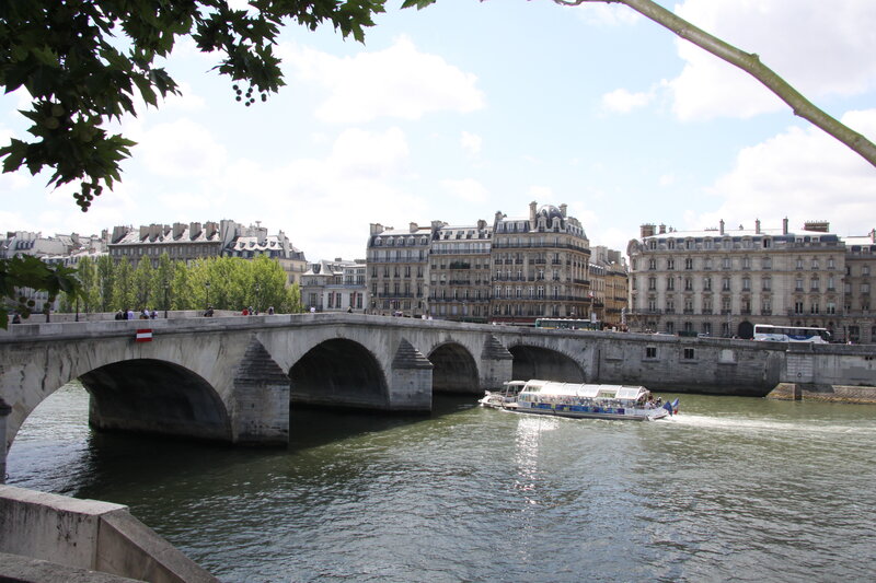 Boat under Stone Bridge
