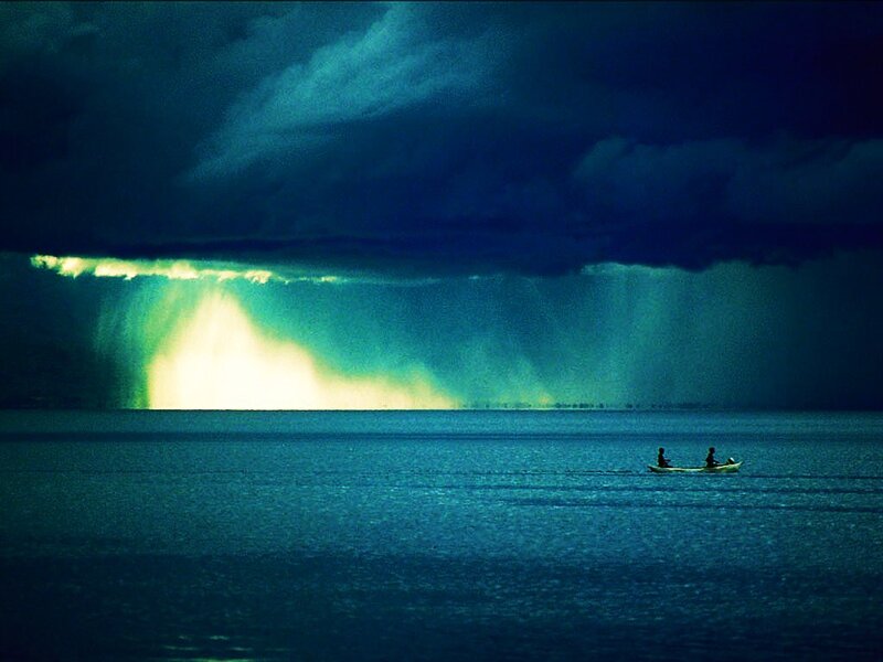 Boat under stormy sky