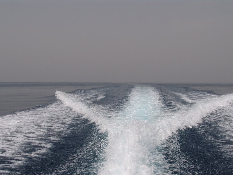 Boat Wake on Ocean — Blue, Calm