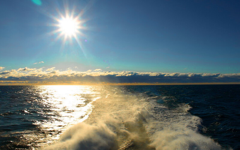 Boat Wake on Ocean — Blue, Dramatic