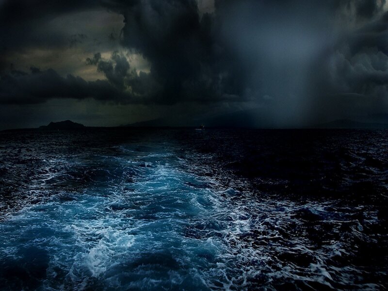 Boat Wake on Stormy Sea — Blue