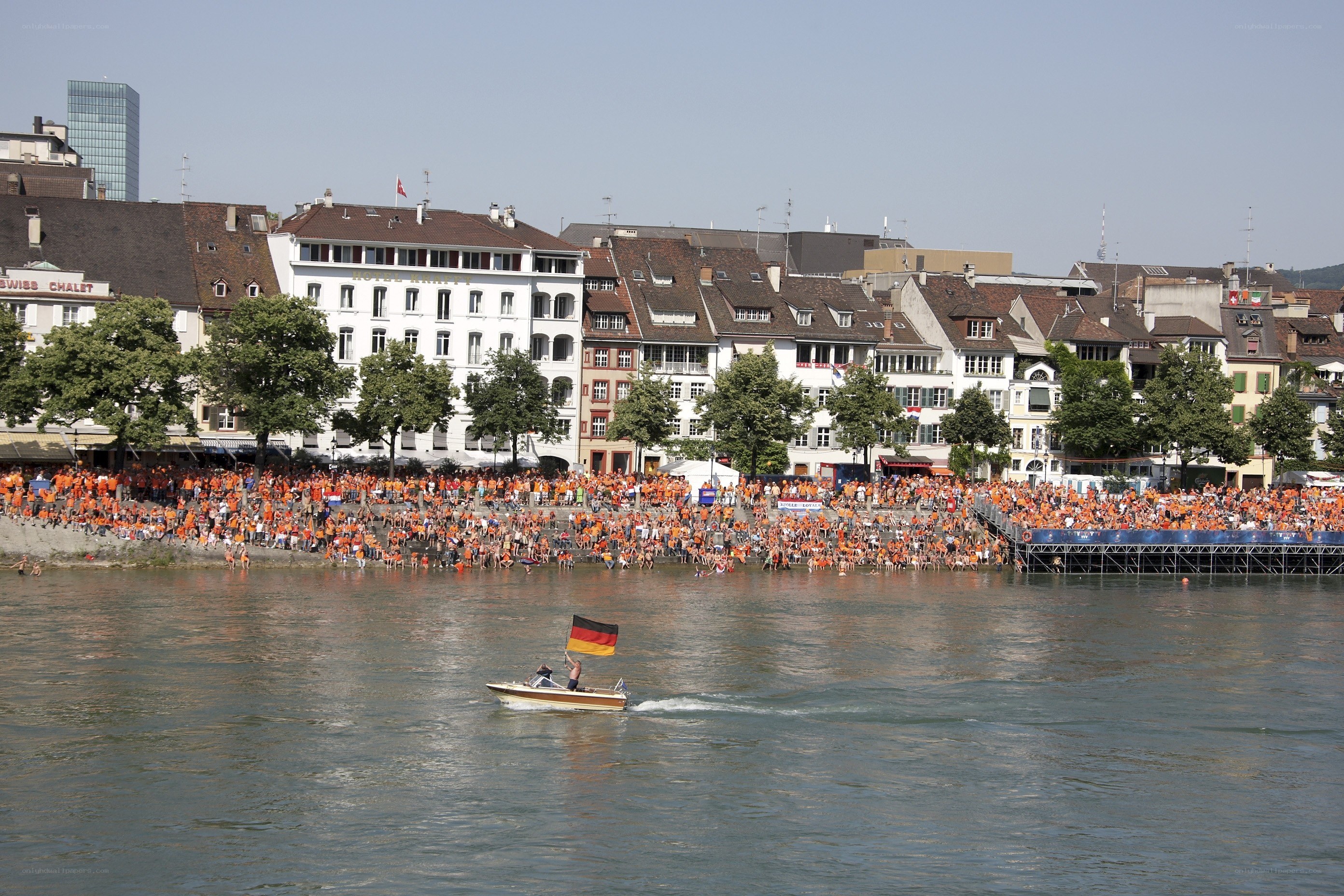 Boat with German flag on river