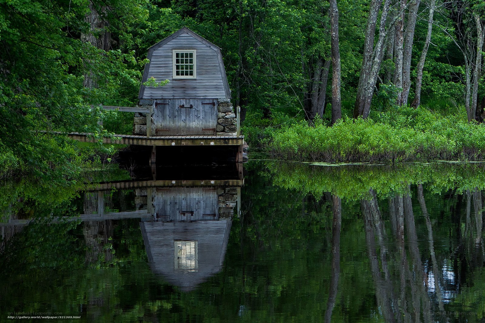 Boathouse on a calm lake