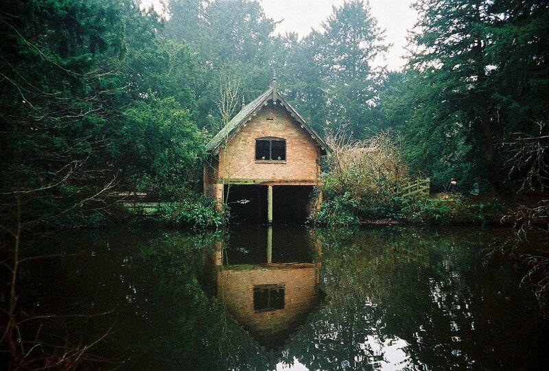 Boathouse on a forest pond