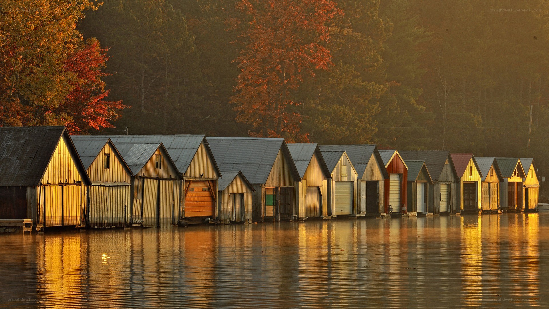 Boathouses at sunset