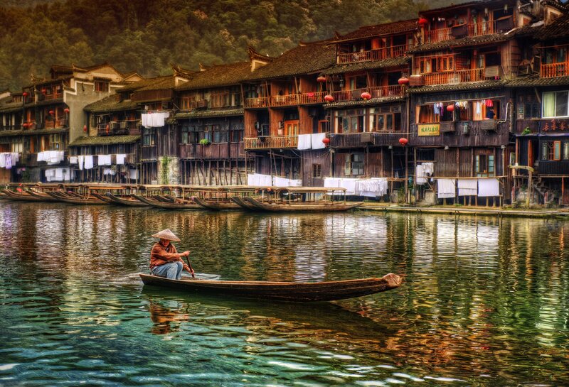Boatman in a Small Boat