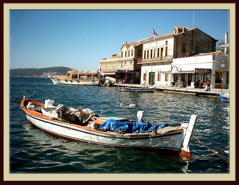 Boats at a coastal town harbor